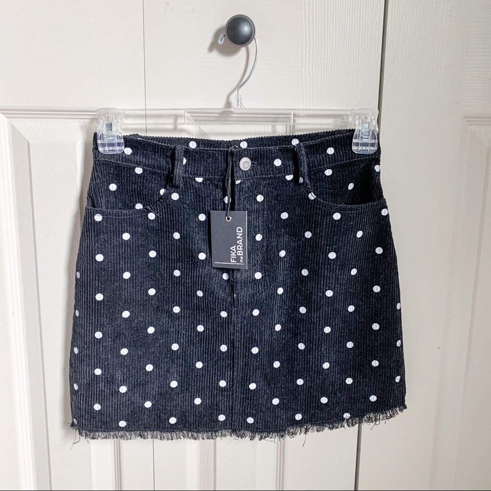 Black corduroy mini skirt w/ white polka dots